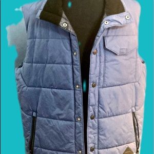 Men’s North Face puffy vest size Meduim